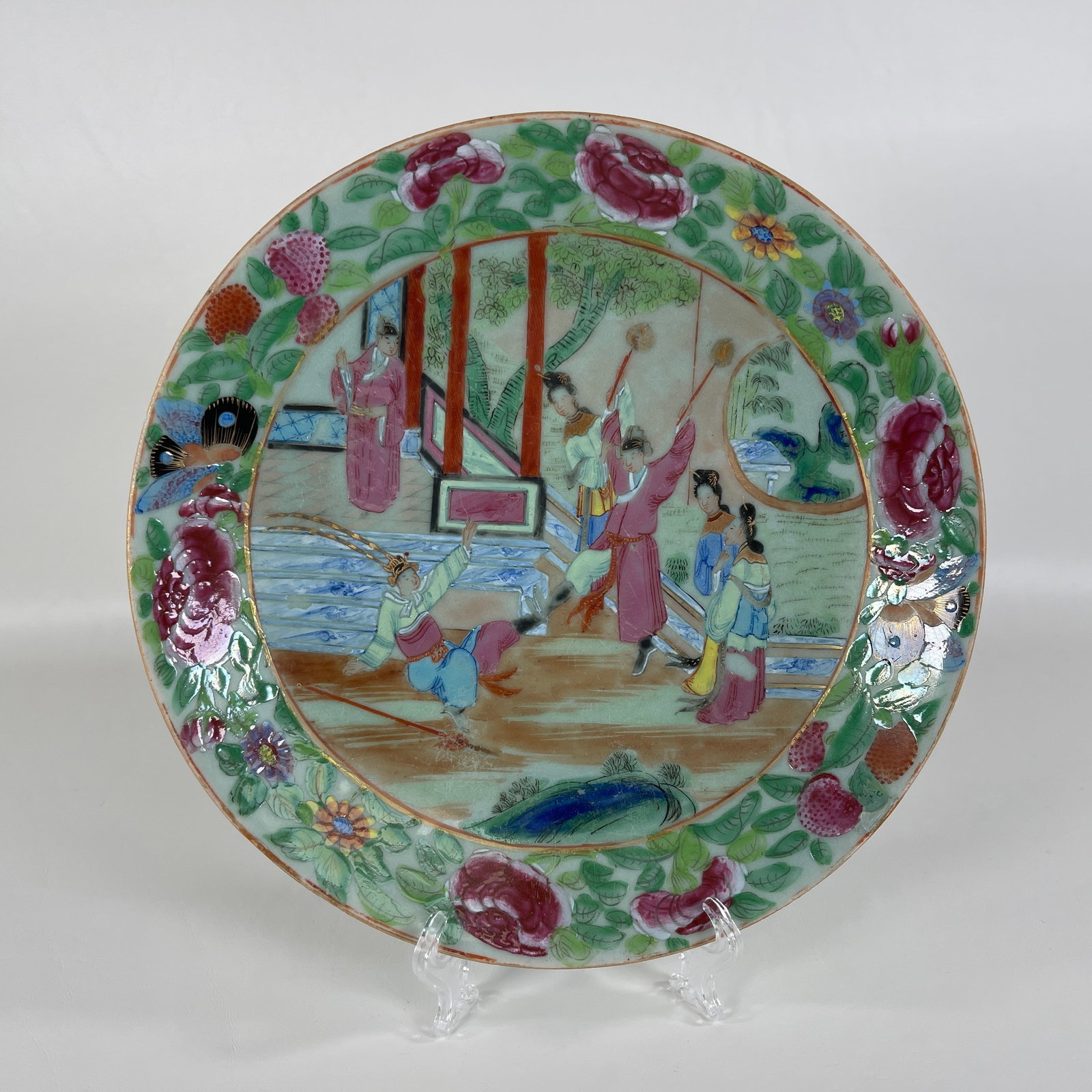 19th Century Rose Mandarin Chinese Porcelain Plate: Measures 10" wide. Plate has a few repairs on the rim, also has one small rim chip.
