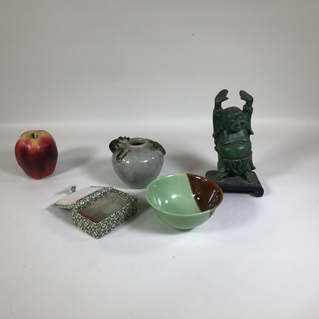 (4) Asian Decorative Objects: Figure Measures 3.75“ wide, 2.75“ deep, 6.75“ tall. Vase Measures 4“ wide, 4“ deep, 3.5“ tall. Bowl Measures 4.5“ wide, 4.5“ deep, 2.25“ tall. Box Measures 2.25“ wide, 3.25“ deep