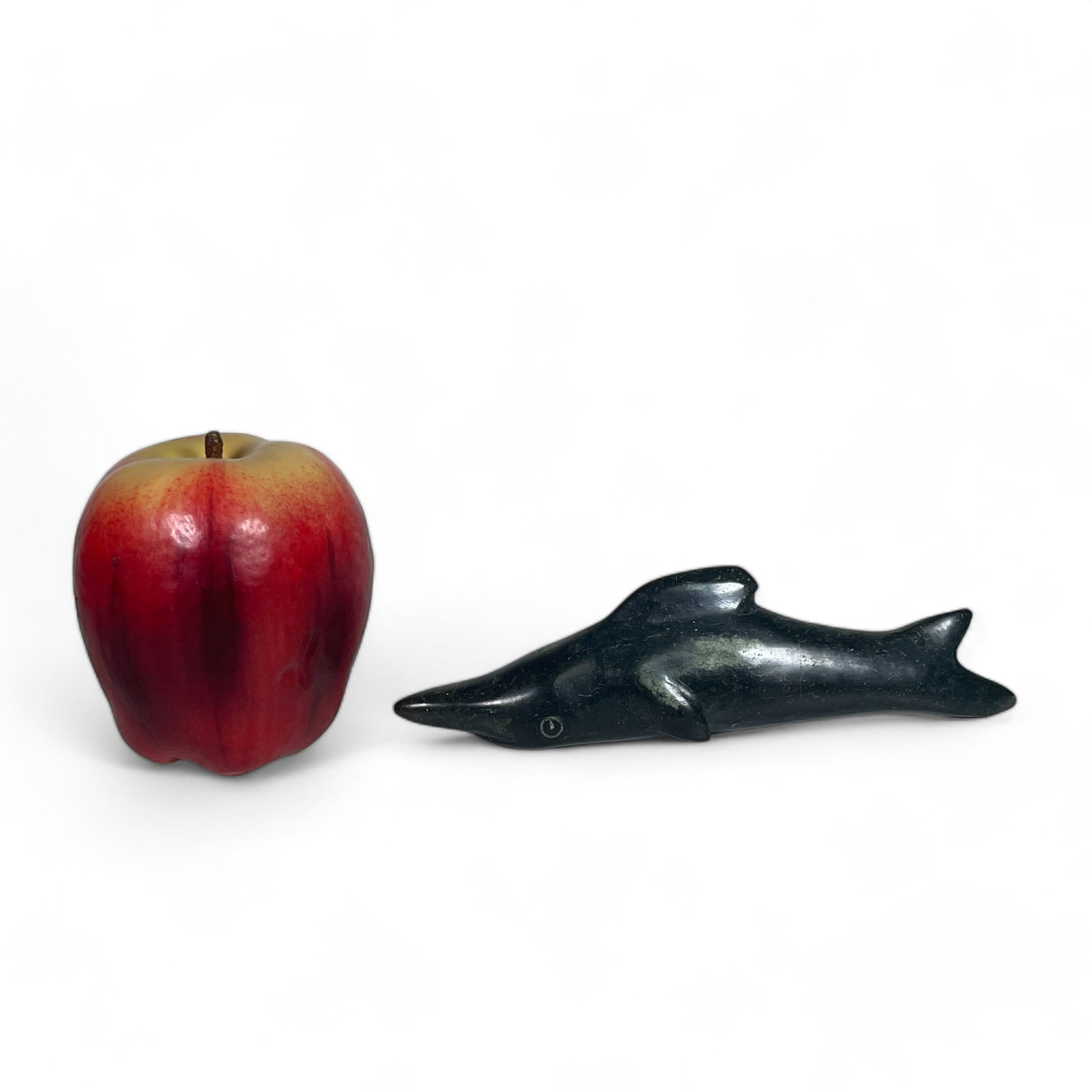 Inuit Carving of a Aquatic Animal: Measures 7" wide, 1 1/4" deep, 1 3/4" tall.