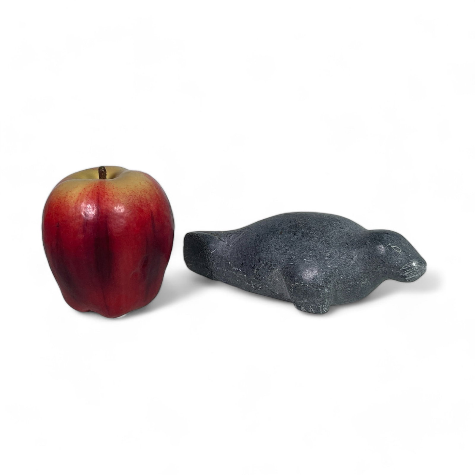 Inuit Carving of a Seal: Measures 6 1/4" wide, 2 1/2" deep, 2 1/8" tall.