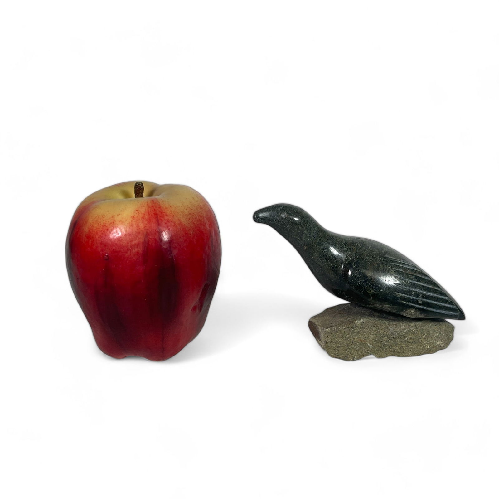 Inuit Carving of a Bird on a Rock: Measures 4 3/8" wide, 2" deep, 3" tall.