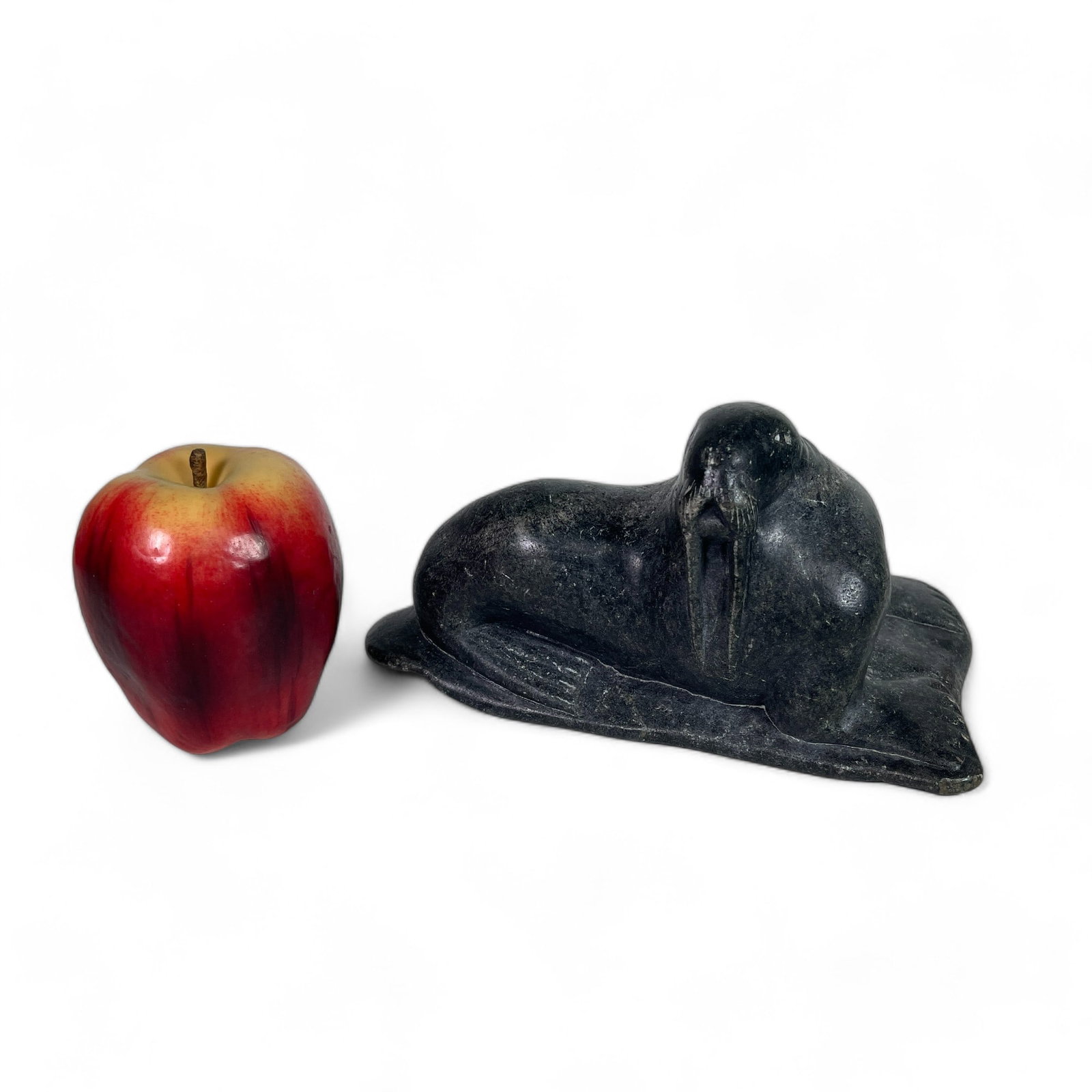 CA Levi Inuit Carving of a Walrus: Measures 8" wide, 5 1/2" deep, 4" tall.