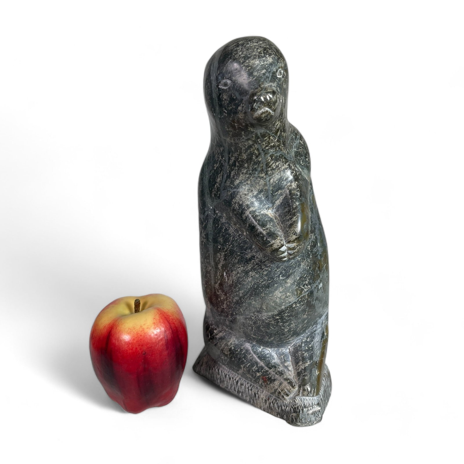Inuit Carving of a Seal: Measures 5" wide, 5" deep, 10 1/2" tall.