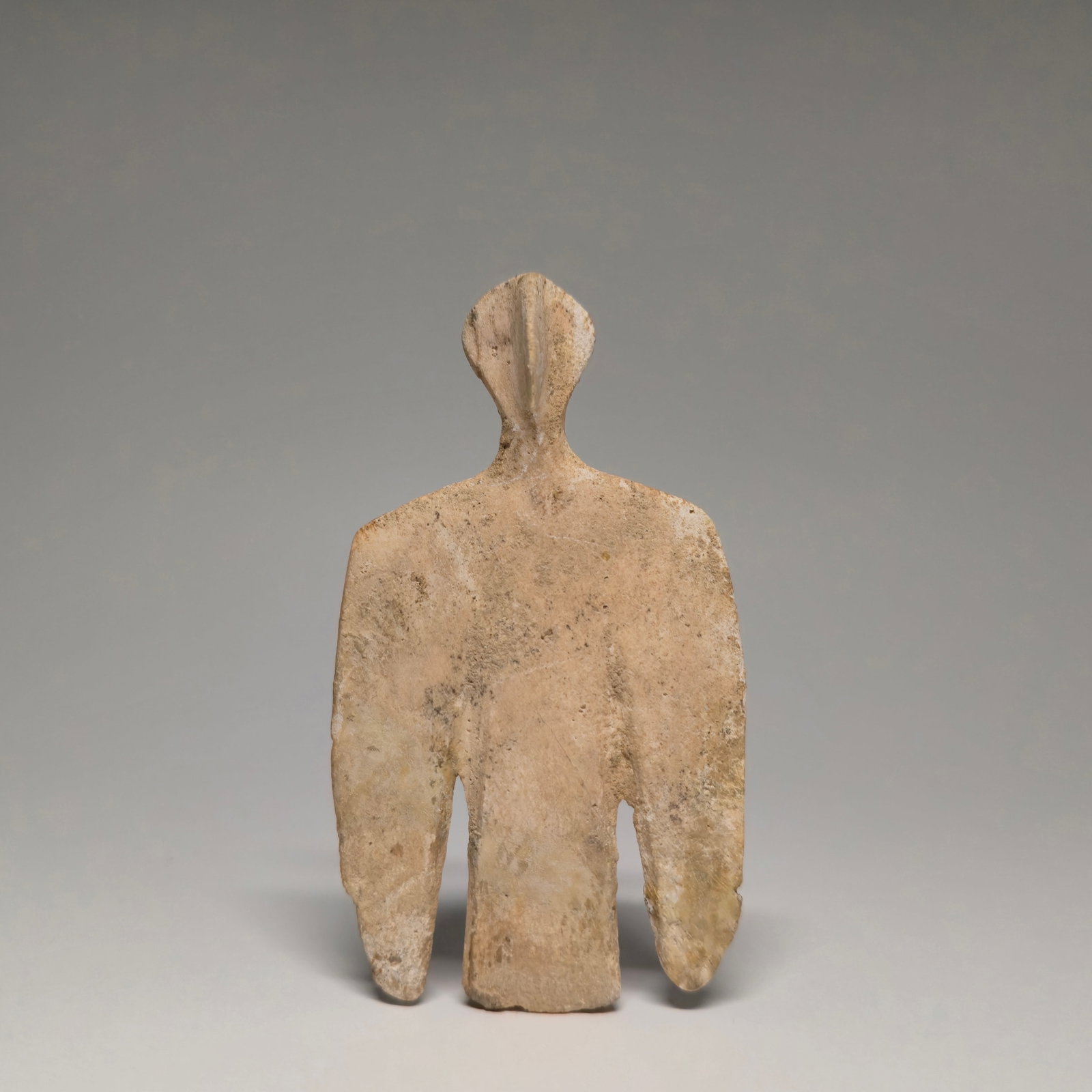 A bactrian marble idol of a winged man (1 of 4)
