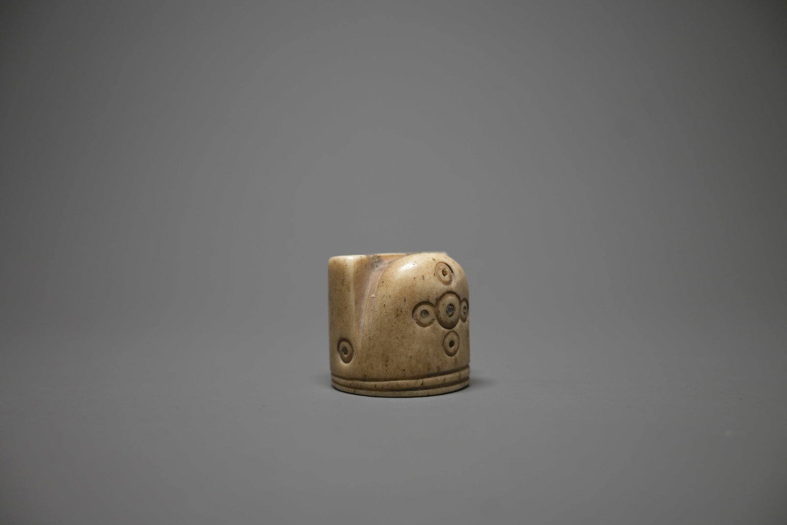 An Early Islamic Bone Chess King (1 of 5)