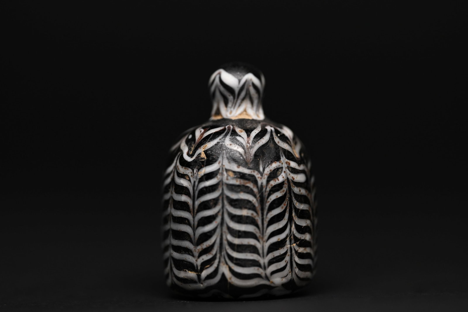 A glass chess or gaming piece (1 of 4)