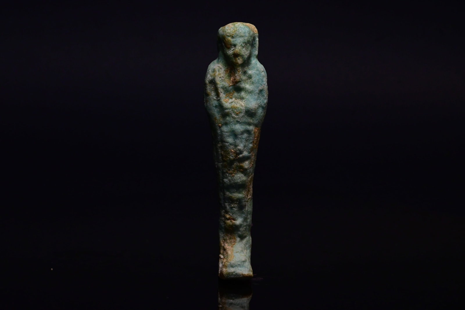 Egyptian Blue-Glazed Faience Shabti: Egyptian Blue-Glazed Faience Shabti,Late Period, 30th Dynasty, Ca. 380 - 343 BC An ancient Egyptian blue faience ushabti. The mummiform figurine wears a tripartite wig.Size: 10cm