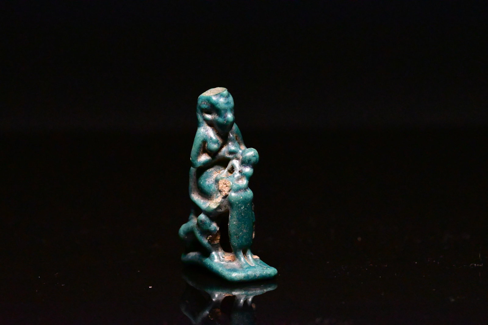 Egyptian blue-glazed faience of seated isis (1 of 6)