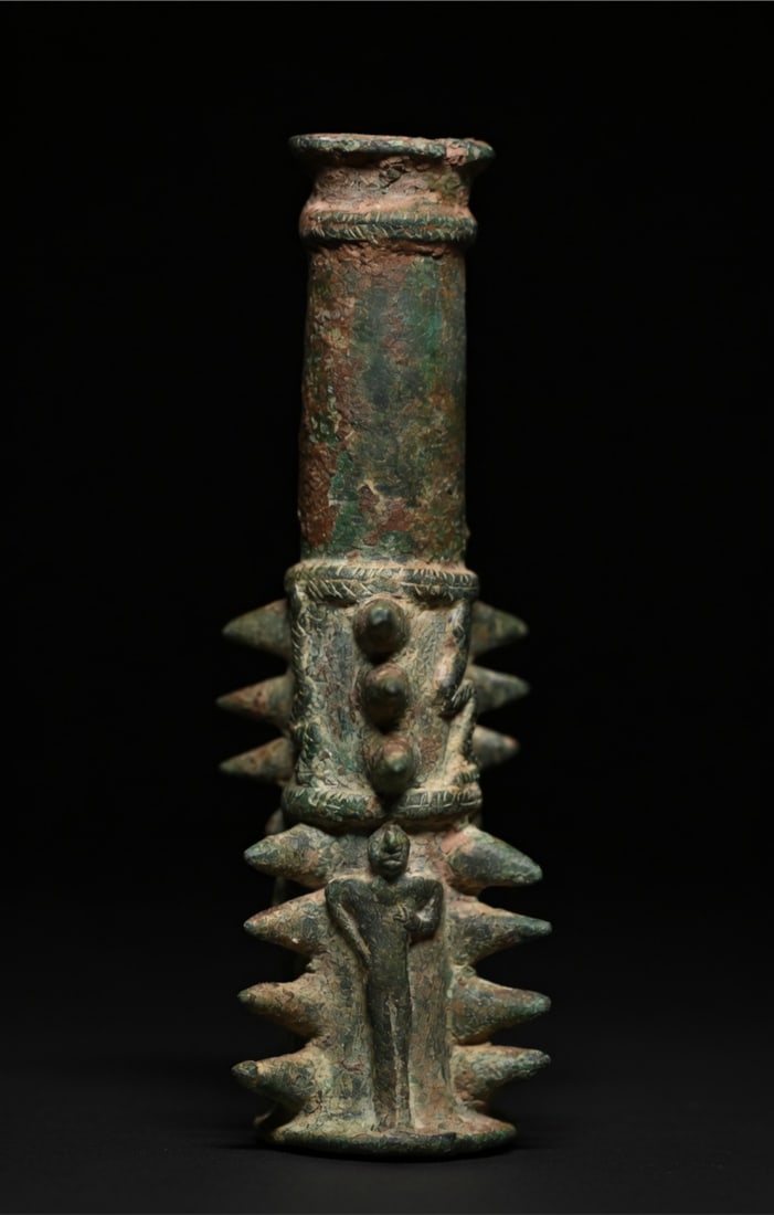 Elamite bronze macehead: AN MESAPOTAMIAN-ELAMITE BRONZE MACE HEADEARLY 2ND MILLENNIUM B.C.With figures and snakes.Size: 15cm H