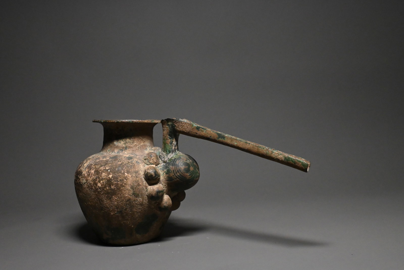 A luristan bronze spouted vessel: 1st milleniam. BC, 8th – 7th century. BC a luristan bronze spouted vessel.Size: 15cm H x 27cm longProvenance: property of an european collector, acquired in early 1990s.