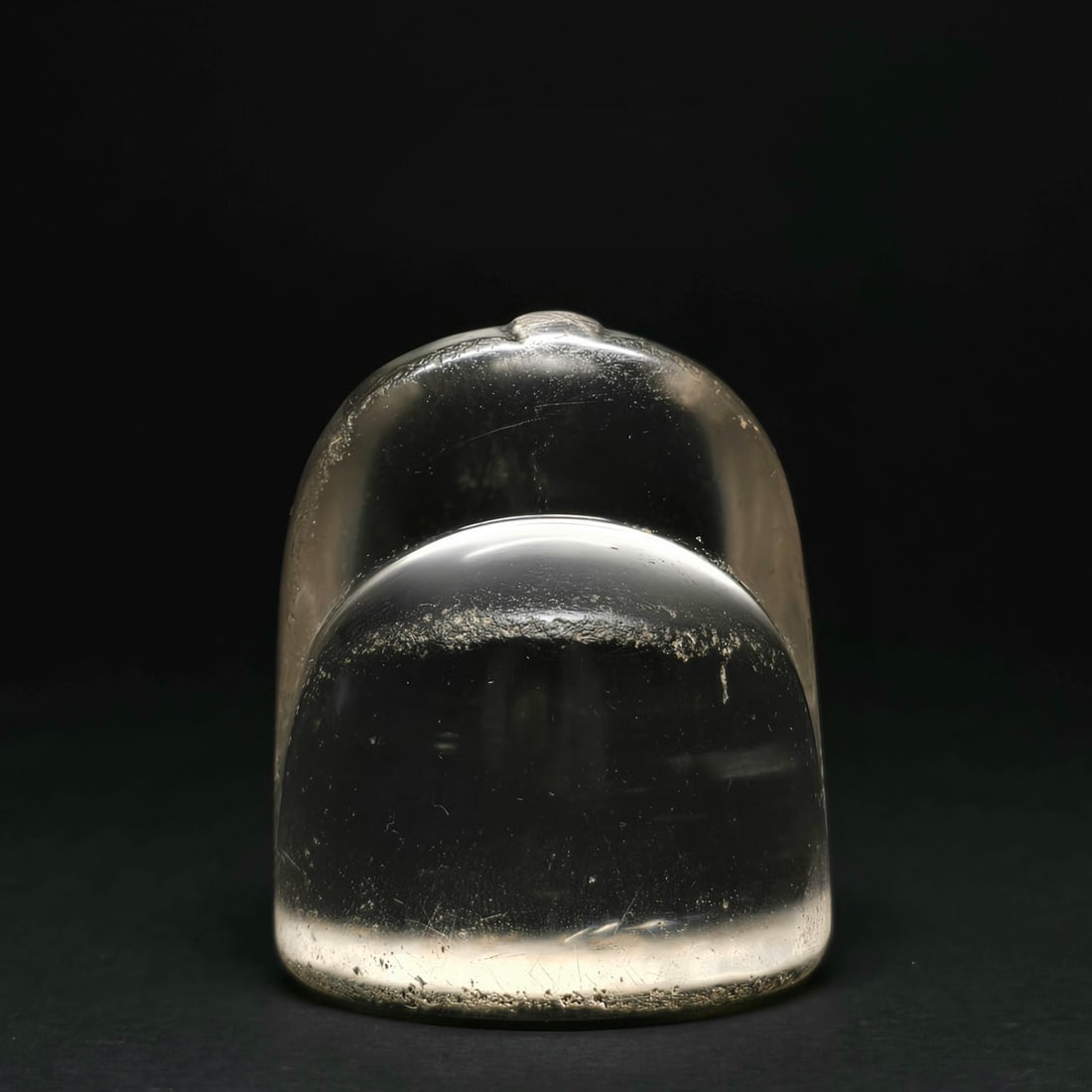 A rock crystal chess piece of King: Early-islamic probanly east iranian 11thC rock crystal chess piece of a king.Size: 5.5cm H x 4.5cm Diameter