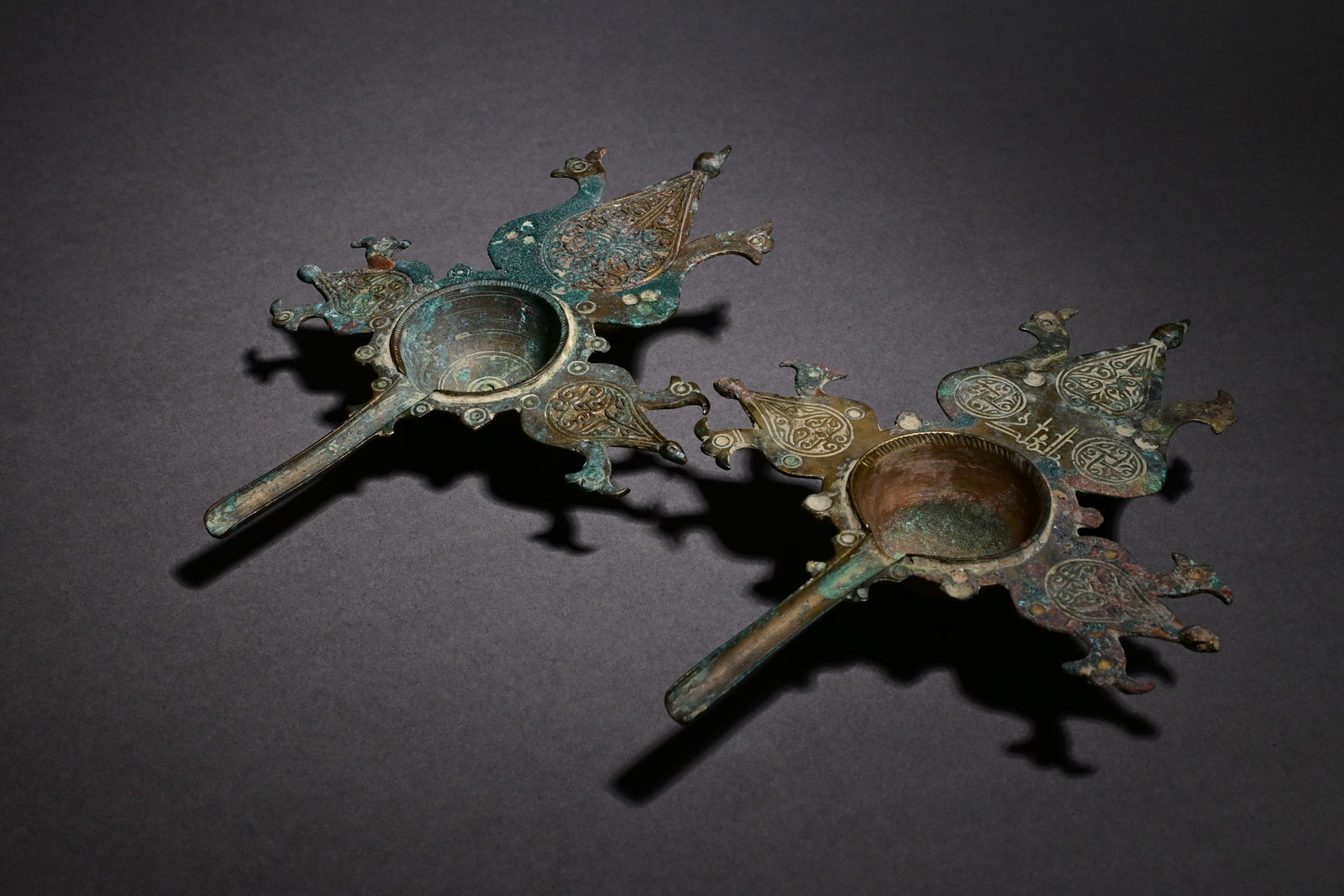 A rare pair of islamic bronze cosmetic vessels: A Rare Pair of medieval Islamic Bronze Cosmetic Vessels (Usmadan),cosmetic vessels, attributed to Khorasan or Transoxiana (Mawarannahr), dating to the 11th–12th century AD. These belong to a scarce 