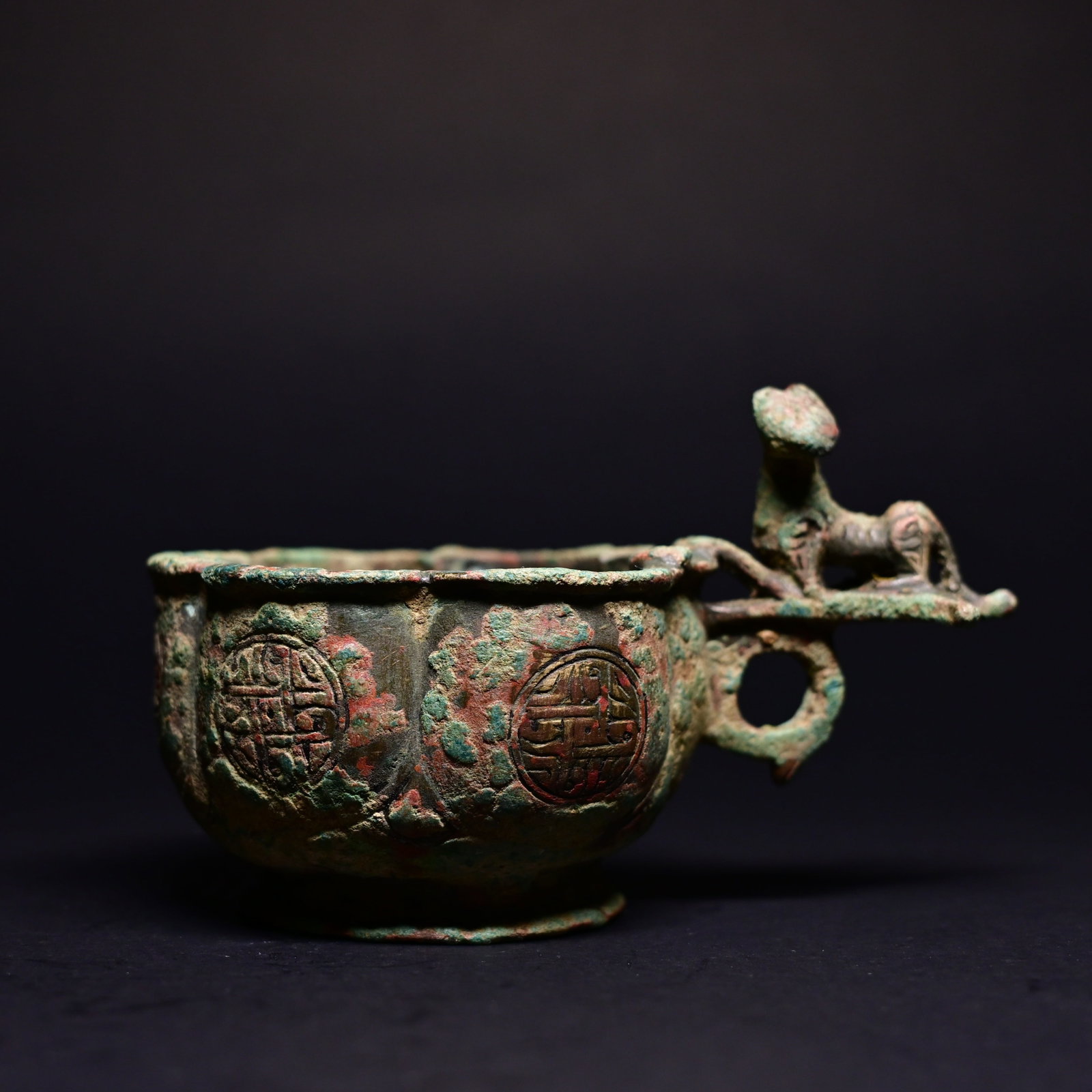 A BRONZE LOBED CUP, PERSIA, 11TH/12TH CENTURYA BRONZE LOBED CUP, PERSIA, 11TH/12TH CENTURY (1 of 9)
