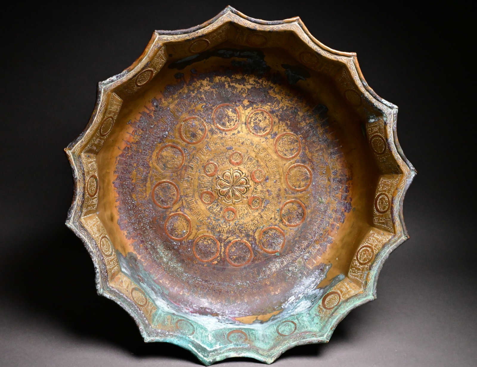 A large Seljuk copper-inlaid bronze 'Lagan' basin. (1 of 12)