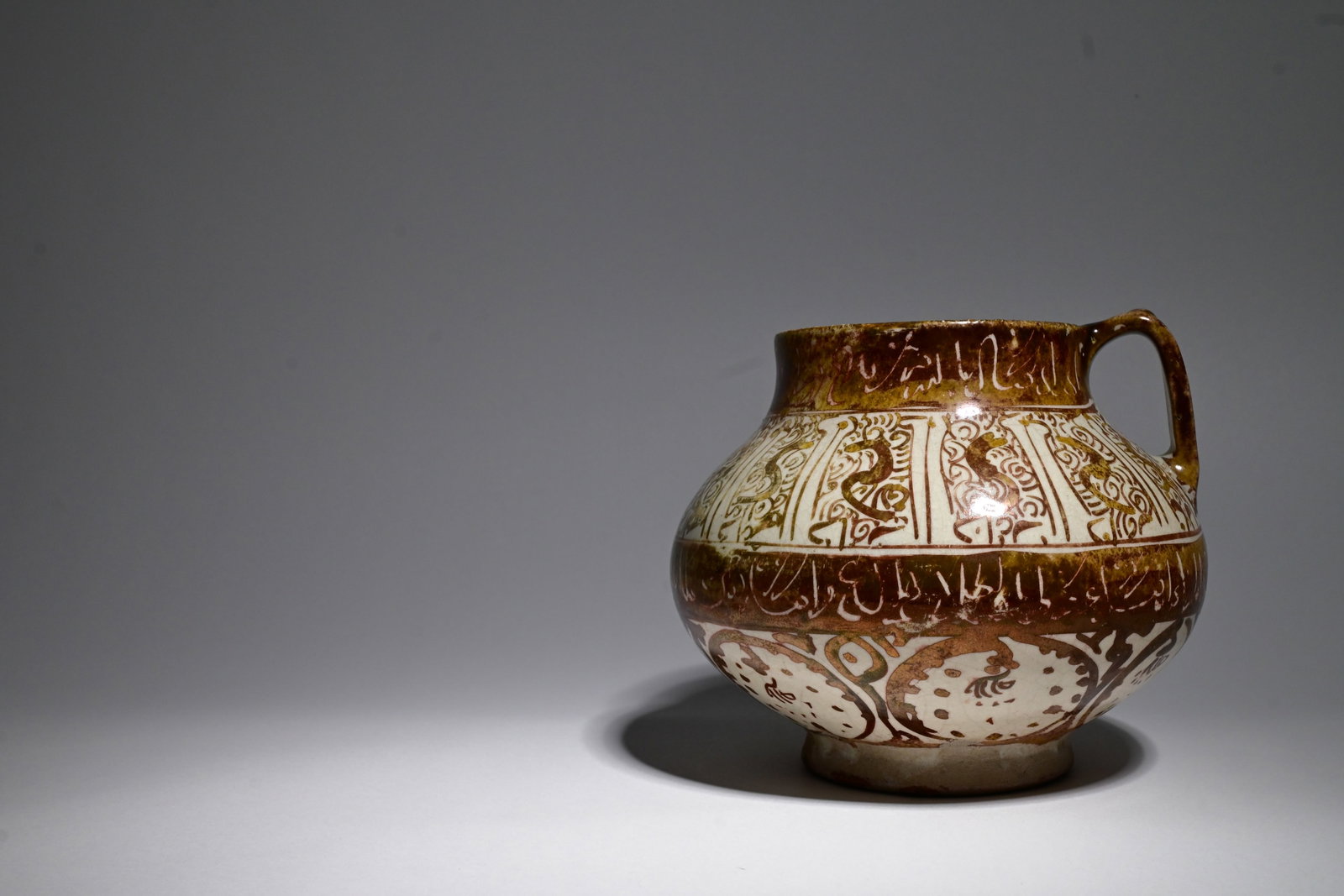 A Kashan Lustre Pottery Jug, 12-13thCentury. (1 of 9)