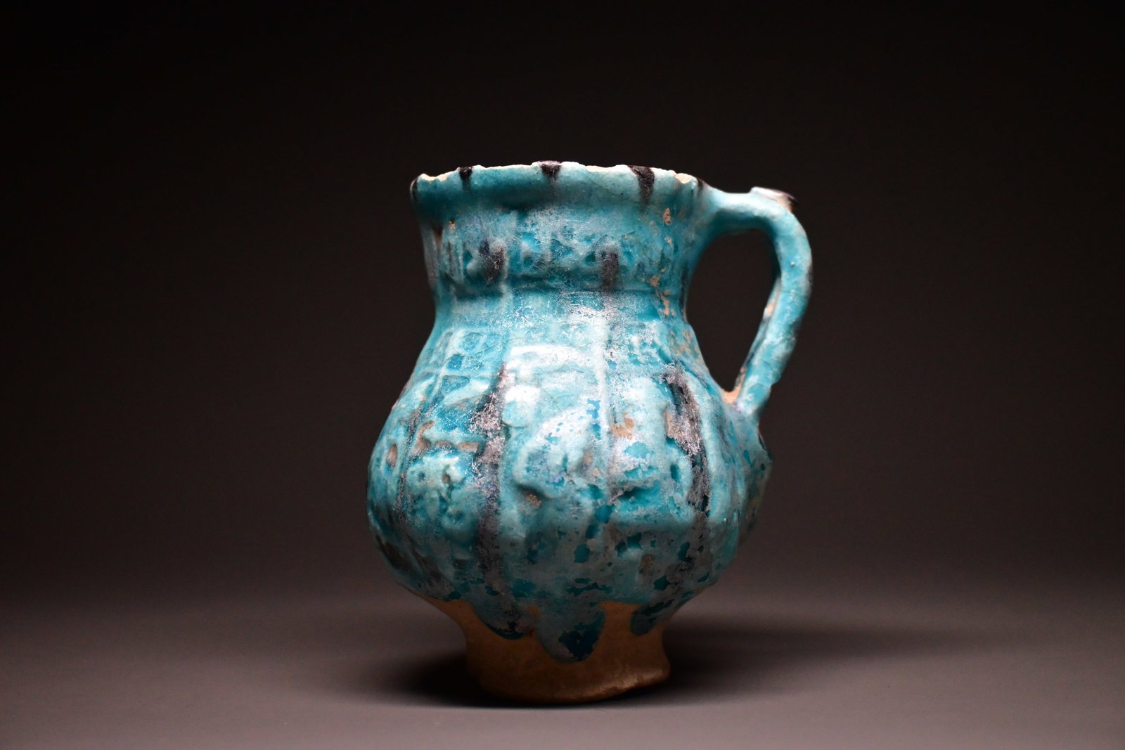 A rare 12th century Kashan pottery jug (1 of 6)