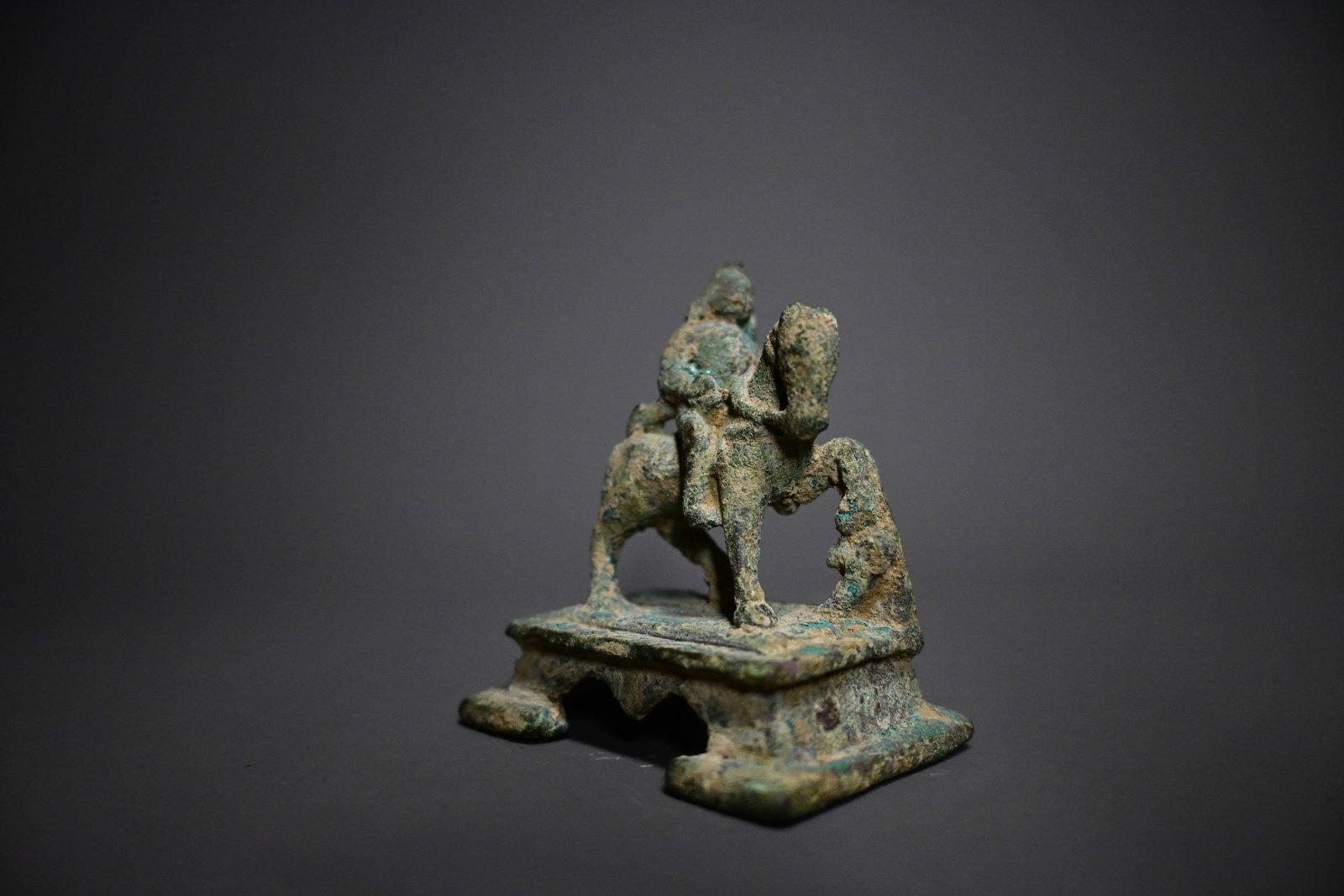 A Gupta Bronze Sculpture of Buddha on Horseback, 300 CE - 600 CE: Gupta Bronze Sculpture of Buddha on Horseback, 300 CE - 600 CESize:6cm H x 5cm long.Provenance: property of an european collector, acquired in early 1990s