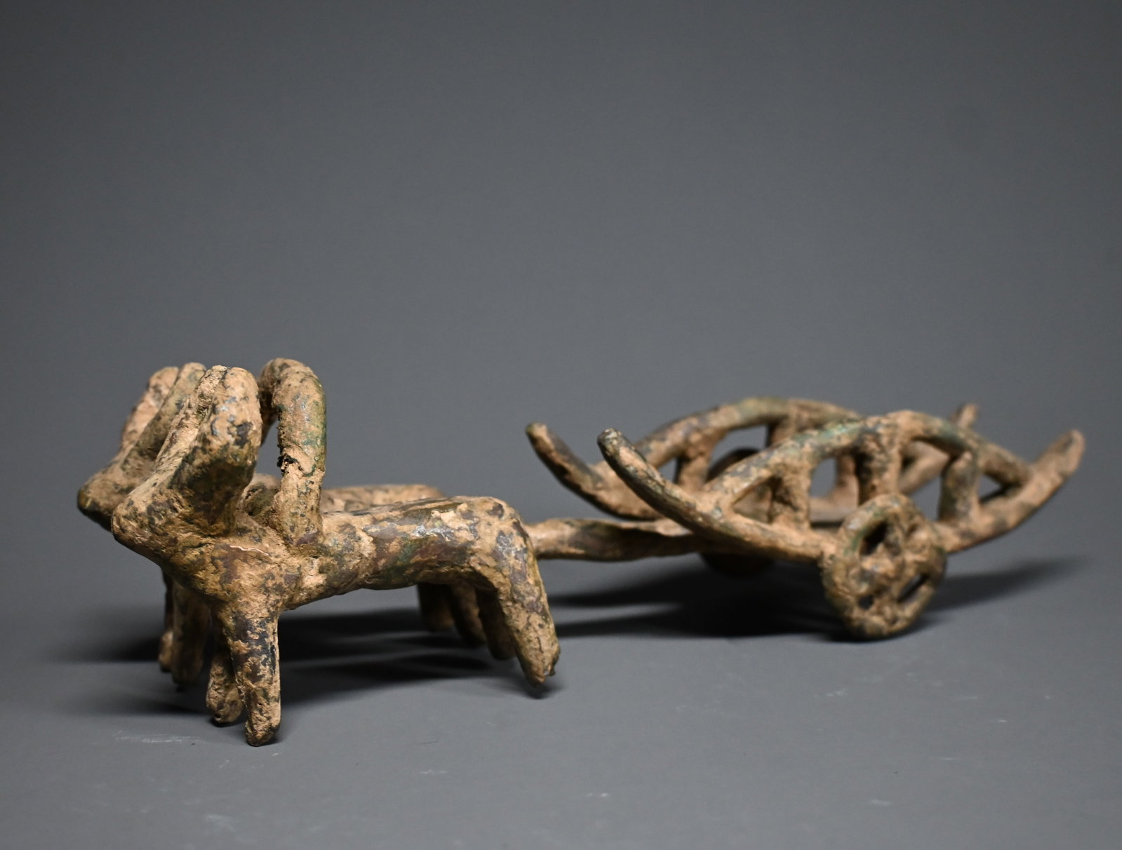 Near Eastern Amlash or Anatolian Bronze Chariot with Pair of Bulls: Near Eastern Amlash or Anatolian Bronze Chariot with Pair of BullsCirca 2nd–1st Millennium B.C.....Size:24cm long x 8cm H....Provenance: property of an european collector, acquired in early 1990s