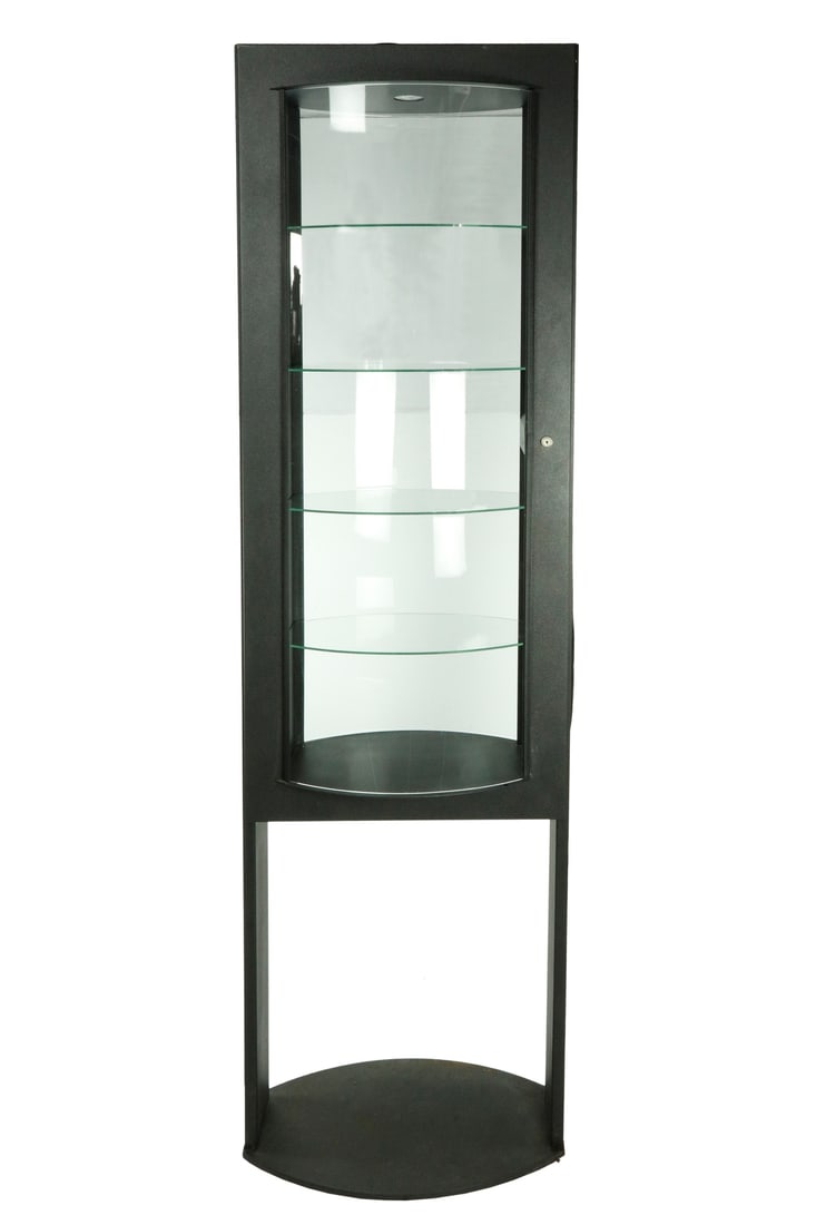 Vetrina a colonna modello "Saba" - Produzione: Cattelan Italia / Ravarini Castoldi: Vetrina a colonna modello "Saba" - Produzione: Cattelan Italia / Ravarini Castoldi Raffinato mobile espositore verticale a pianta semicircolare. Struttura in metallo laccato nero con vano a giorno inf