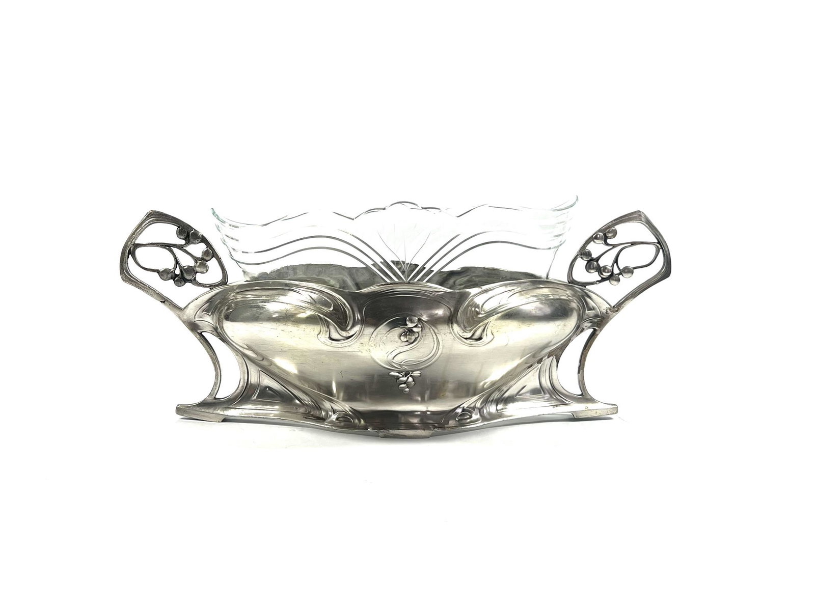 Art nouveau silvered metal and glass centerpiece: An Art Nouveau silvered metal centerpiece with original glass insert circa 1905. marked " I/o" and "F. Costra" at the base Approximate measurements: 7"H x 17"W x 7.5"D