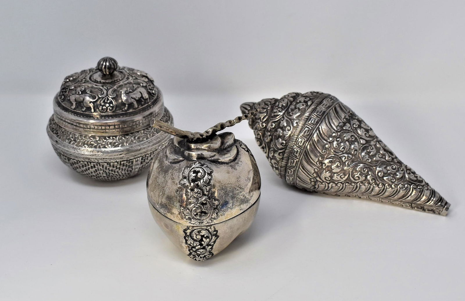 A grouping of three Indian / Tibetan silver objects (1 of 18)