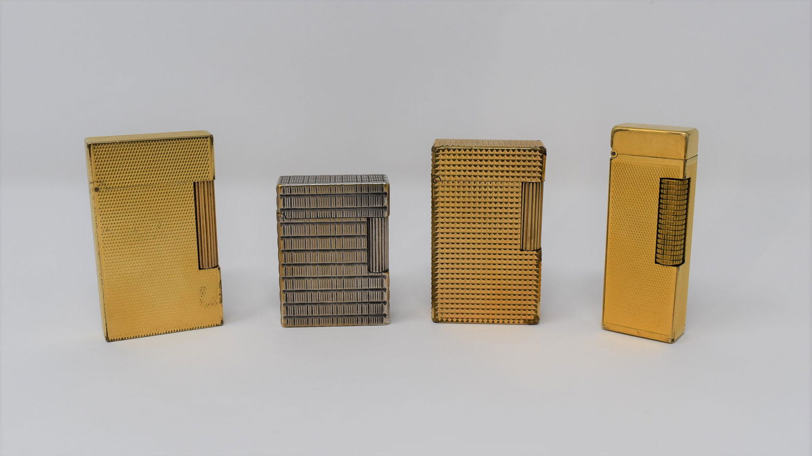 Grouping of four vintage Lighters, S.T Dupont and Dunhill (1 of 9)