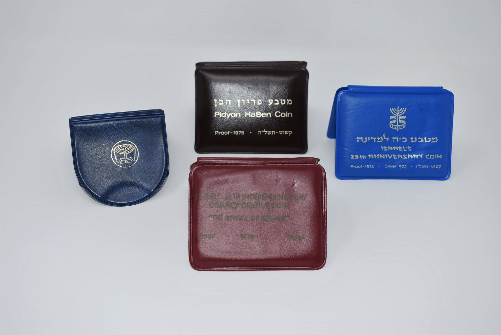 Grouping of four Israeli commemorative silver coins (1 of 6)