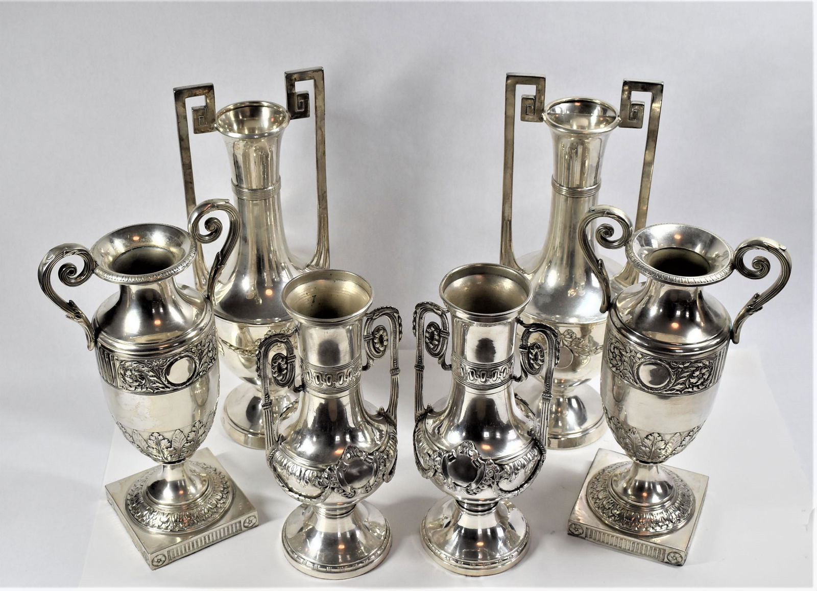 Grouping of three pairs of antique classical form silver plated brass vases (1 of 18)