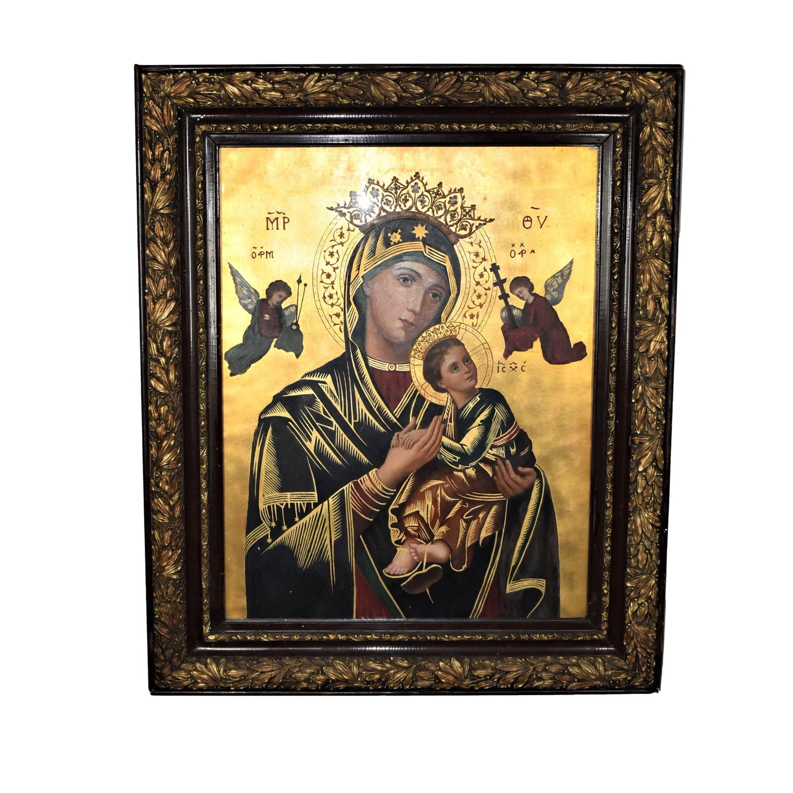 Large Antique oil on canvas of Virgin and Child: A large antique Byzantine style oil on canvas painting of the Madonna and Child. Probably of Greek or eastern European origin. 19th century. Apparently un-signed. Framed and under glass. approximate m
