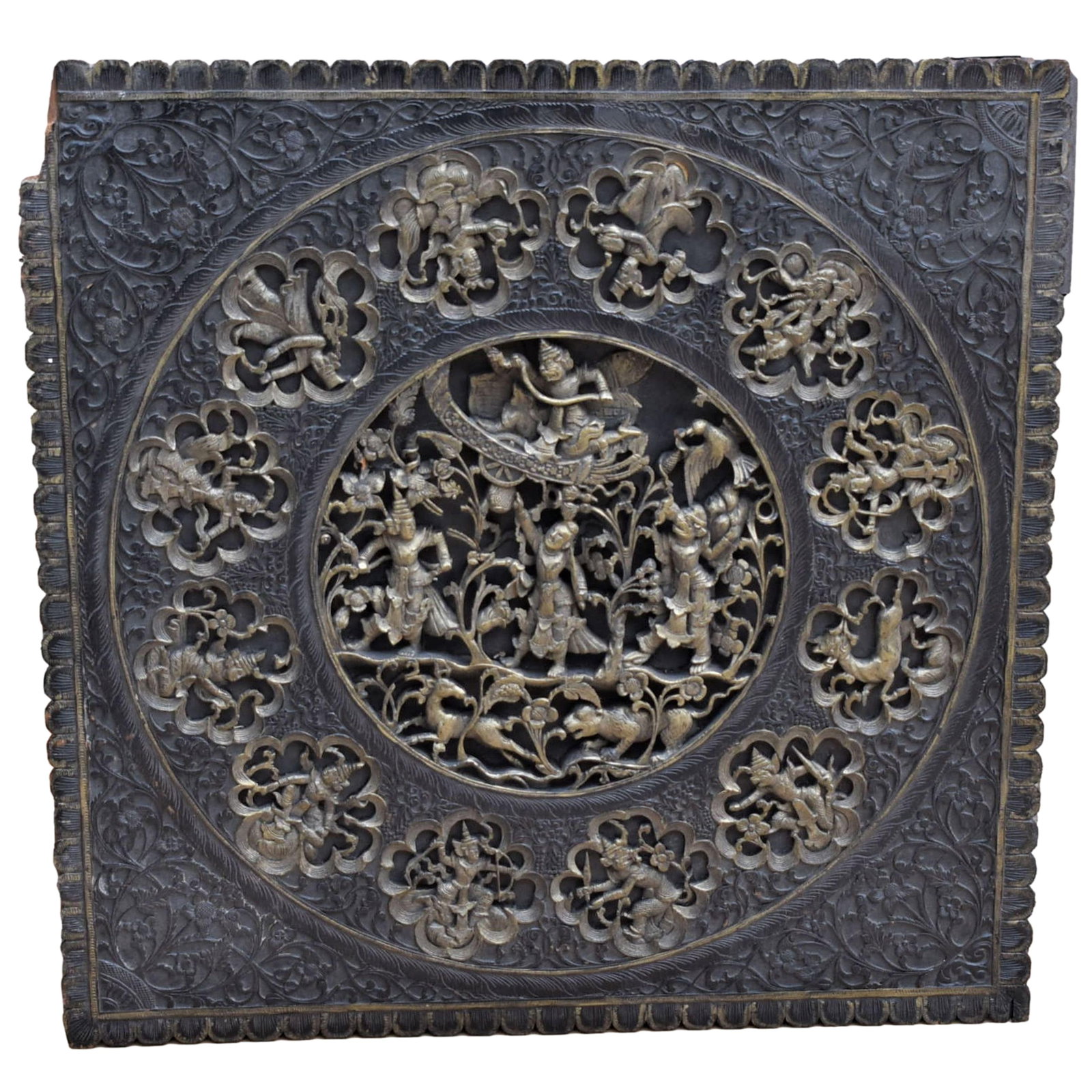 Large antique/vintage Indonesian carved wood relief panel: A large antique or vintage Indonesian carved wood relief panel. The intricate scene is deeply carved in high relief. Iconography un-known. Approximate measurements: 30"H x 29.5"W Deker Auctions will n