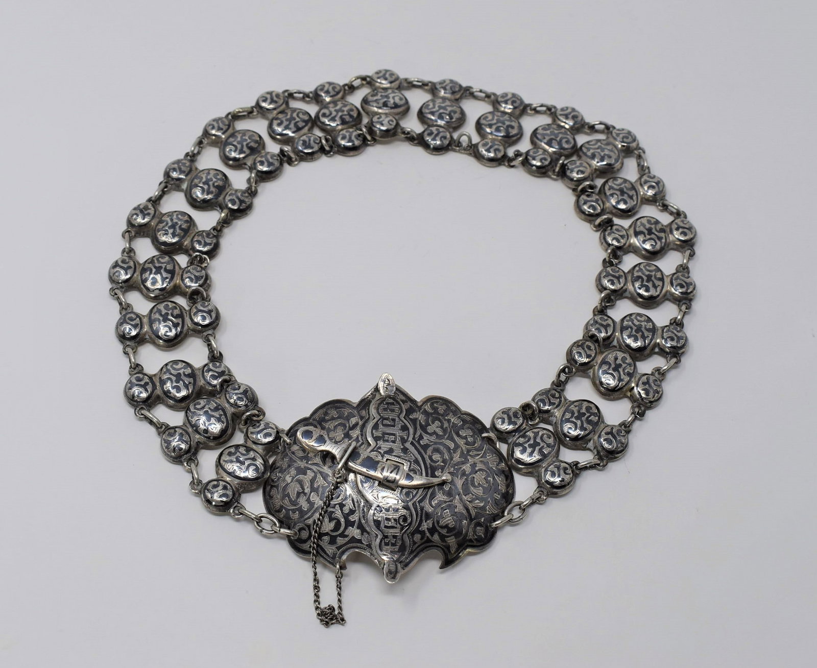 Russian niello decorated solid silver belt: An antique or vintage Russian niello decorated sold silver ladie's belt. Marked 84. Assayer's and maker's marks un-identified. Weight: 164g Approximate measurements: 25.25"L x 2.5"W In-house domestic 