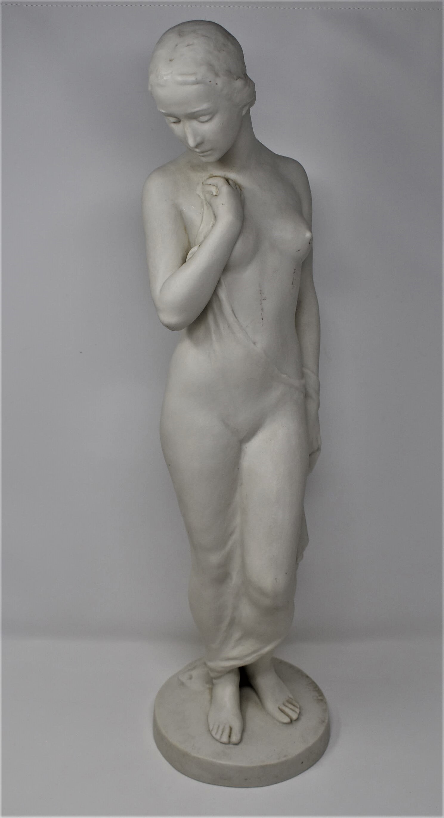 Art Deco R. kaesbach for Rosenthal nude figurine: A 1930's signed" R. kaesbach" for Rudolf Kaesbach biscuit porcelain figurine featuring a female nude. Rosenthal, Germany. From a Dix Hills, NY estate. Measurements: 22.5"h x 6" in diameter Deker Aucti