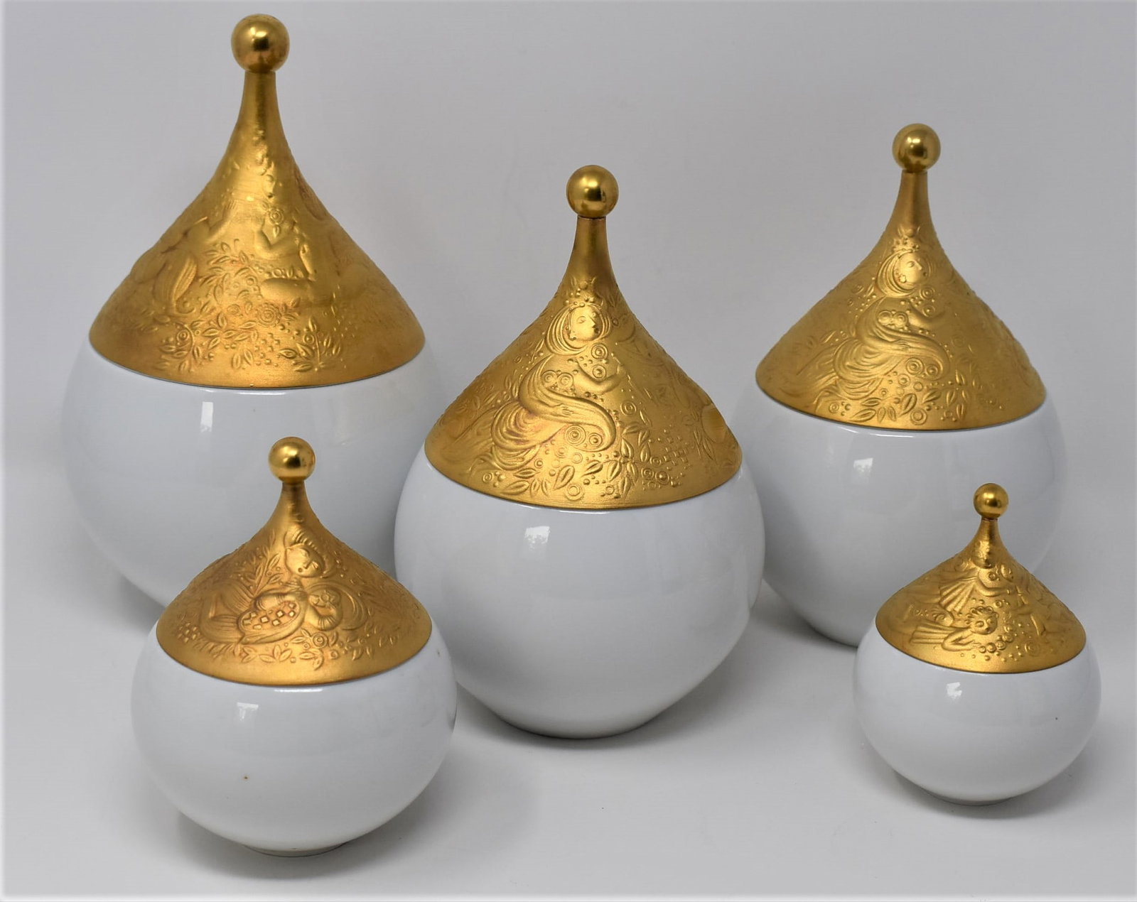 Grouping of 5 Bjorn Wiinblad for Rosenthal" magic flute" porcelain: A grouping of five porcelain items in the " Die Zauberflote " or " magic flute " pattern designed by Bjorn Wiinblad for Rosenthal including 5 covered bowls of different sizes. From a Dix Hills NY esta