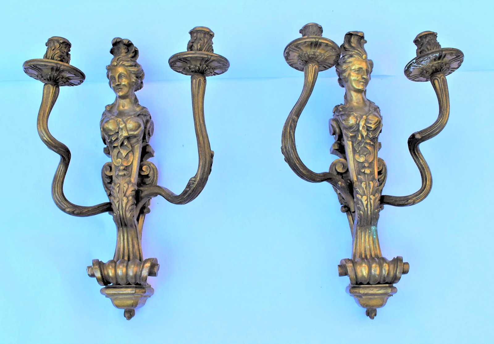 Pair of French gilt bronze figural 2-arm sconces / wall lights: A pair of antique French gilt bronze Louis XV, Rococo style figural sconces / wall lights / appliques circa 1900. heavy solid bronze and well made. Stamped " GB" on the back. Made to accommodate wirin
