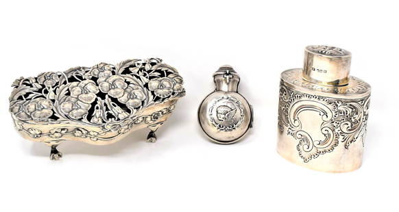 Grouping of three Antique English sterling silver items: A grouping of three Antique English sterling silver items including an Art Nouveau repousse and reticulated hinged box on paw feet, maker's mark for William Comyns & Sons (2"H x5.75"L x 3"D, Weight: 1