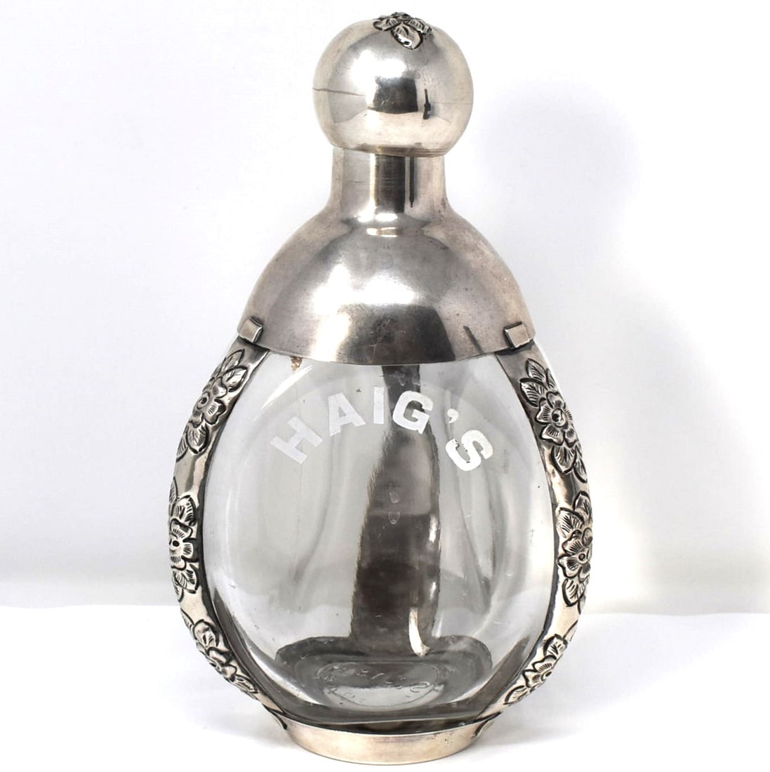 A Mexican Silver Mounted Glass Decanter, Haig whisky engraved (1 of 9)
