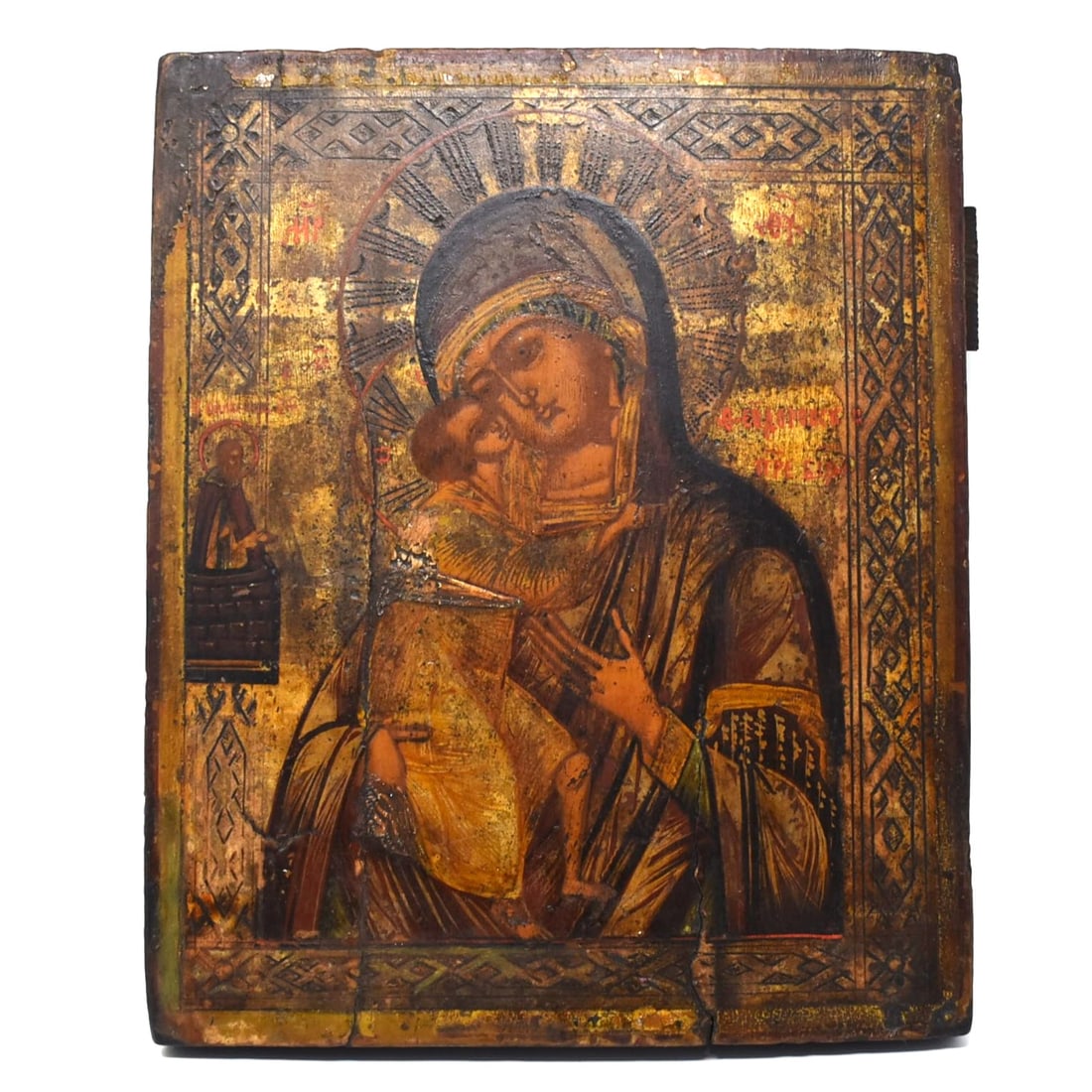 Antique Russian Icon: Feodorov Mother of God: An antique Russian Icon featuring the Feodorov Mother of God . Tempera on wood panel. 10 1/2"H x 8 1/2"W or 27"H x 21.5cm W
