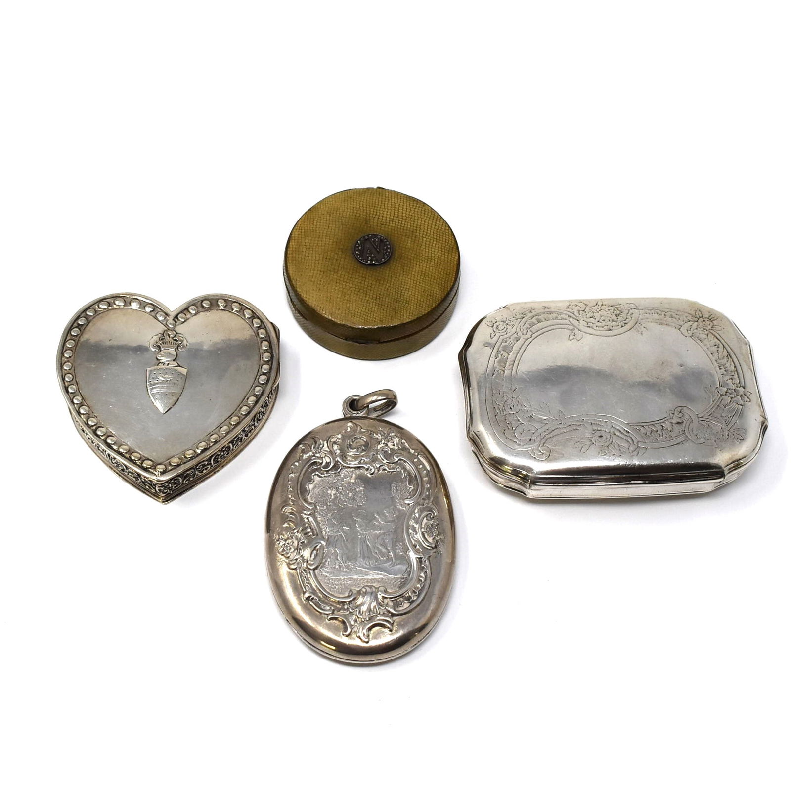 Grouping of silver boxes, a pendant and a shagreen box: A miscellaneous grouping including a heart shaped hinged silver pill box ( with Dutch silver hallmarks? 2 1/2" x 2 1/2" or 6.3cm x 6.3cm, weight: 50.82g), a rectangular continental silver hinged box (