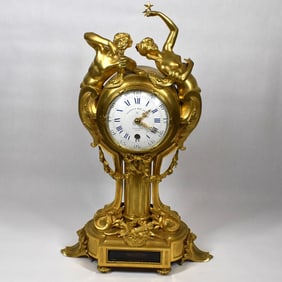 A fine French Grivolas 400 Day Torsion figural gilt bronze mantel clock