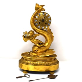 Antique French gilt bronze mantel clock: cherub & dolphin