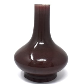 A Chinese copper-red glazed bottle vase, Qing Dynasty