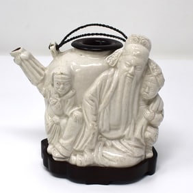 Chinese blanc-de-chine figural teapot