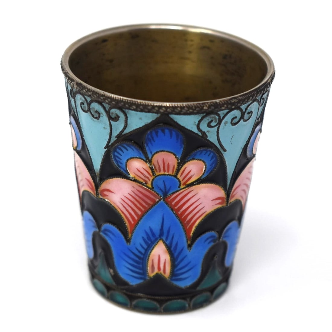 An Estonian Silver and enamel vodka cup: An Estonian .916 silver and enamel vodka cup. Estonian hallmarks and un-identified maker's marks. Gross Weight: 35.7g Approximate measurements: 1 3/4"h x 1 1/2" in diameter or 4.5cm H x 3.7cm in diame