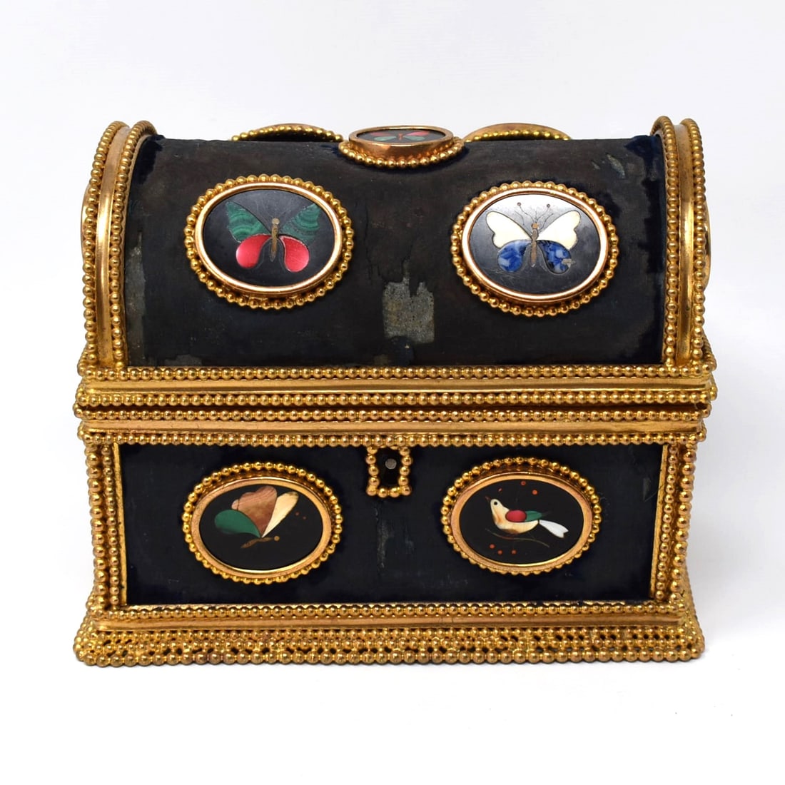 Antique French gilt brass and pietra dura casket circa 1860: An unusual antique French gilt brass casker with Pietra Dura cabochons featuring birds and butterflies. Circa 1860. Un-marked Approximate measurements: 5 3/4"h x 7"W x 4 1/4"D or 14.5cm H x 17.8cm W x