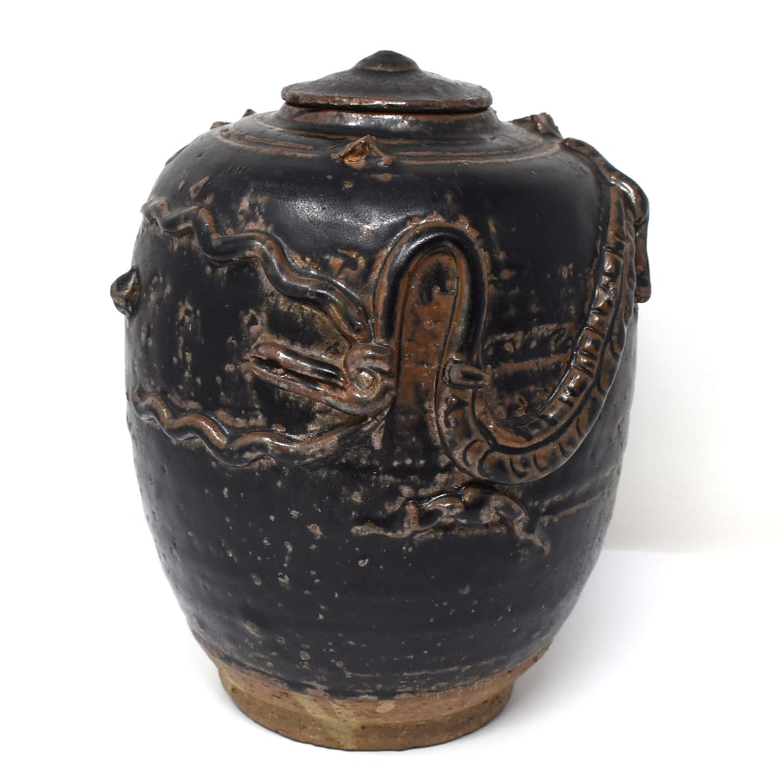 A Chinese black-glazed dragon jar and cover (1 of 20)