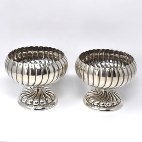 A pair of Josef Hoffman Wiener Werkstaette silver compotes