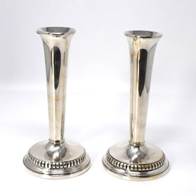 A pair of Art Deco sterling silver candlesticks