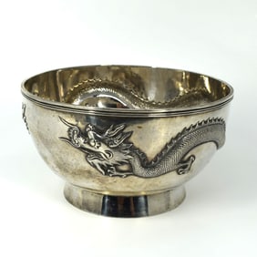 A signed Luen Wo antique Chinese silver dragon footed bowl
