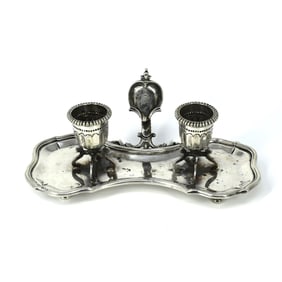 An antique solid silver chamberstick