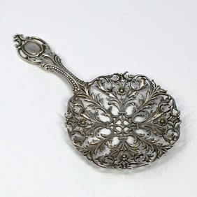 Antique American sterling silver serving spoon, Howard Sterling Co.